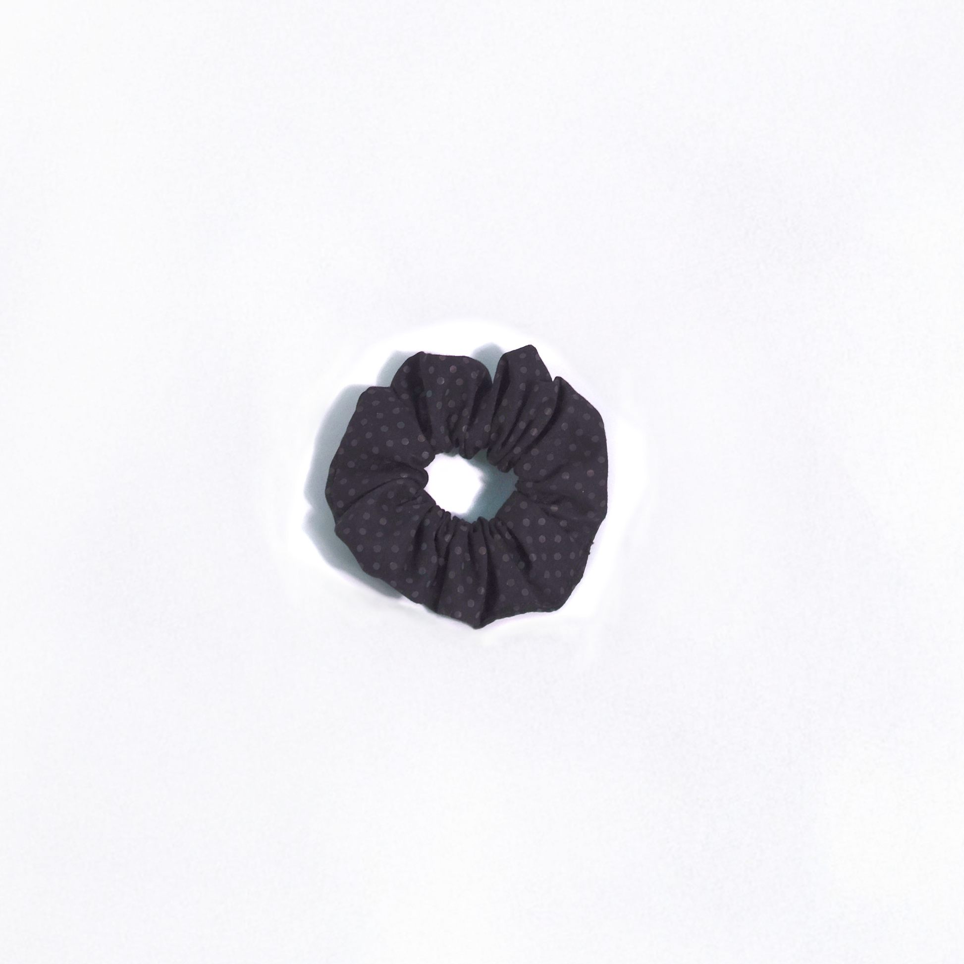 Selene Reflective Scrunchie on a white background in the pattern rainbow and small size